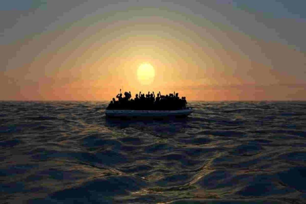 rifugiati su un barcone