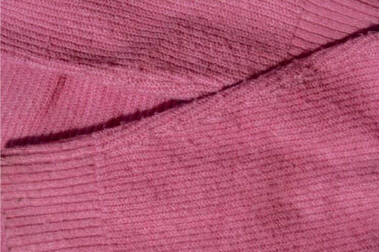 Maglione fucsia pelucchi