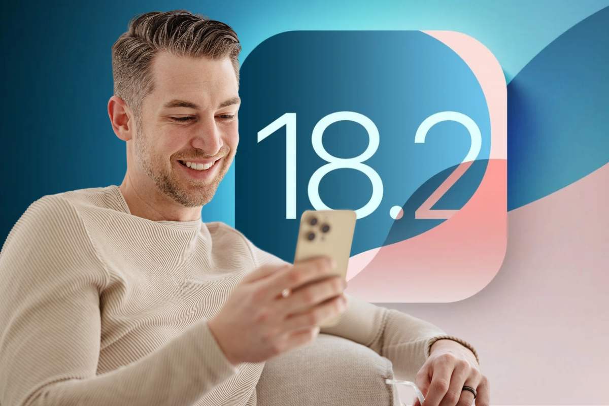 uomo con telefono e iOS 18.2