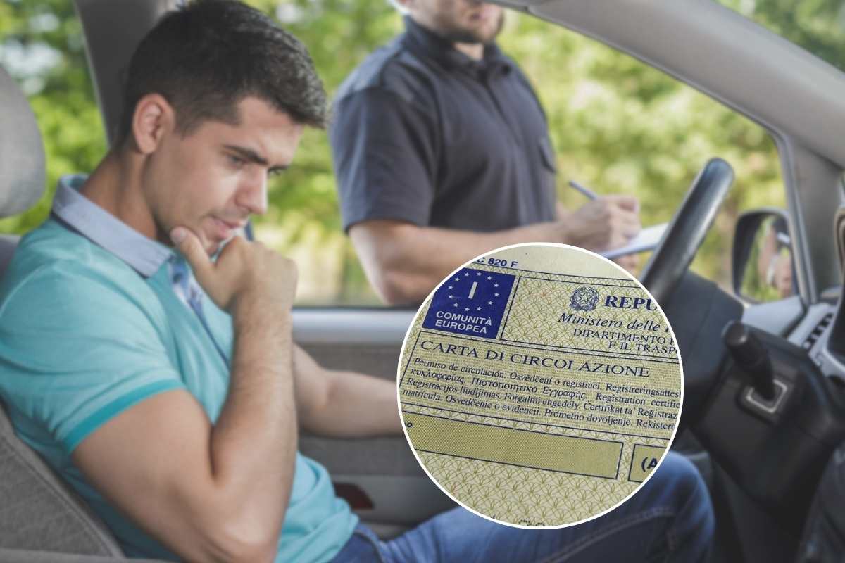 uomo in auto e carta circolazione