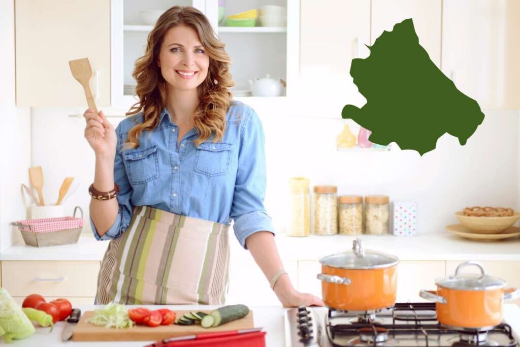 Donna in cucina e simbolo Abruzzo