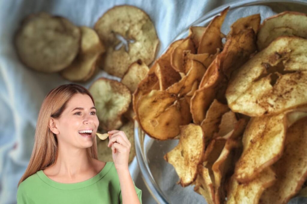 donna che mangia chips di mela