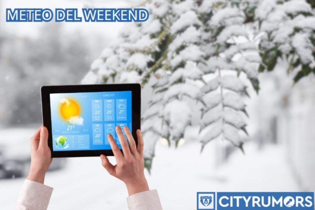 tablet con le previsioni meteo e albero innevato