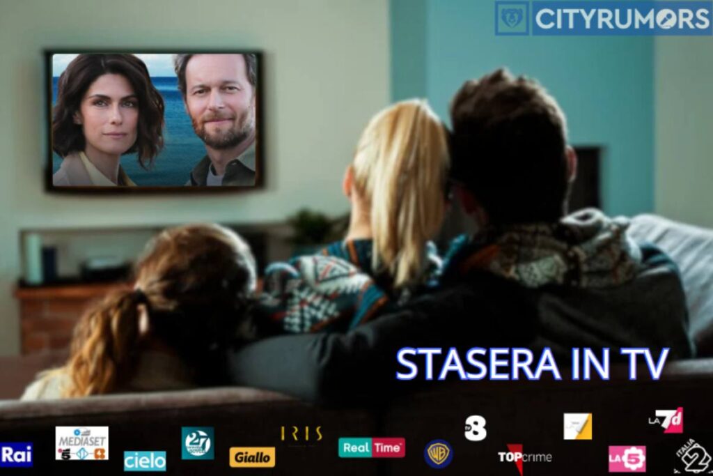 genitori e figlia che guardano la tv