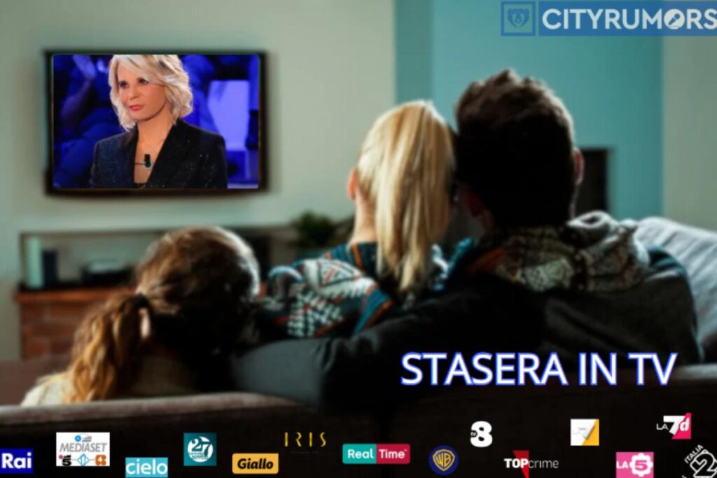 famiglia sul divano che guarda c'è posta per te