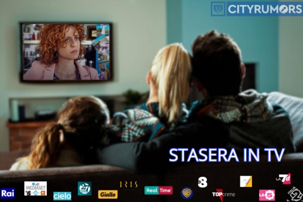 madre padre e figlia che guardano la tv in salotto