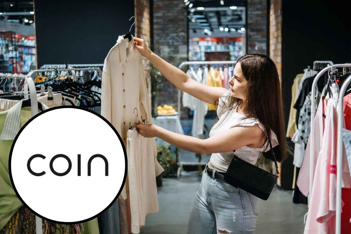 Donna nel negozio di abbigliamento e logo Coin
