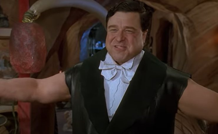 fred in una scena de i flintstones 