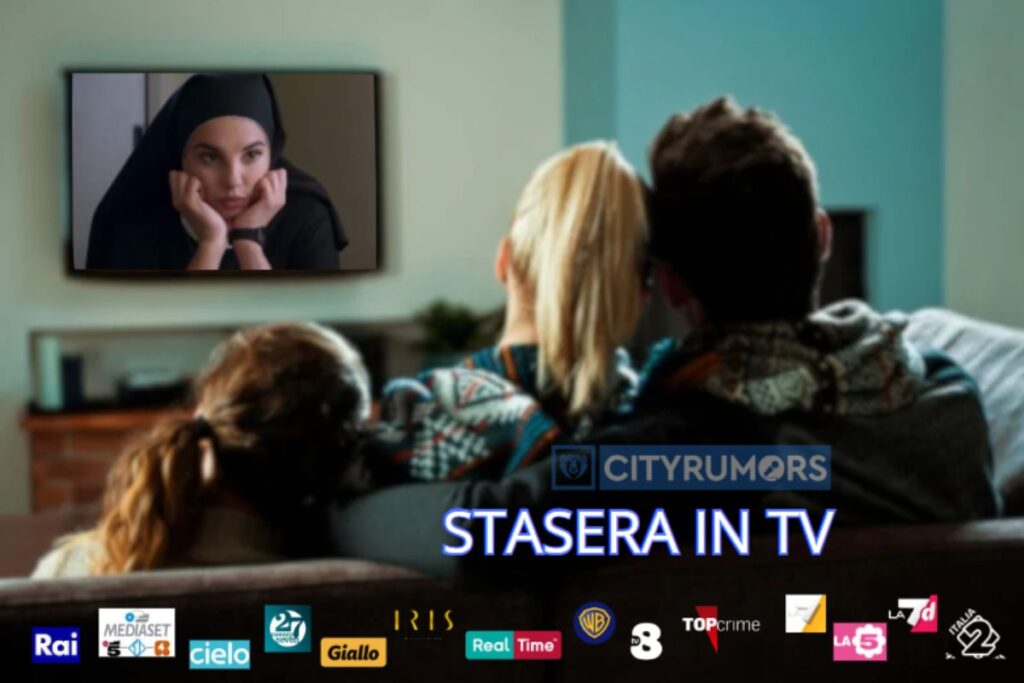 genitori e figlia che guardano la tv