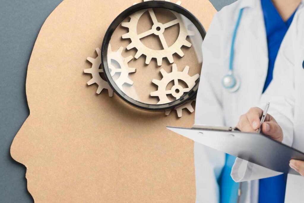 medico con ingranaggi a rappresentazione del cervello