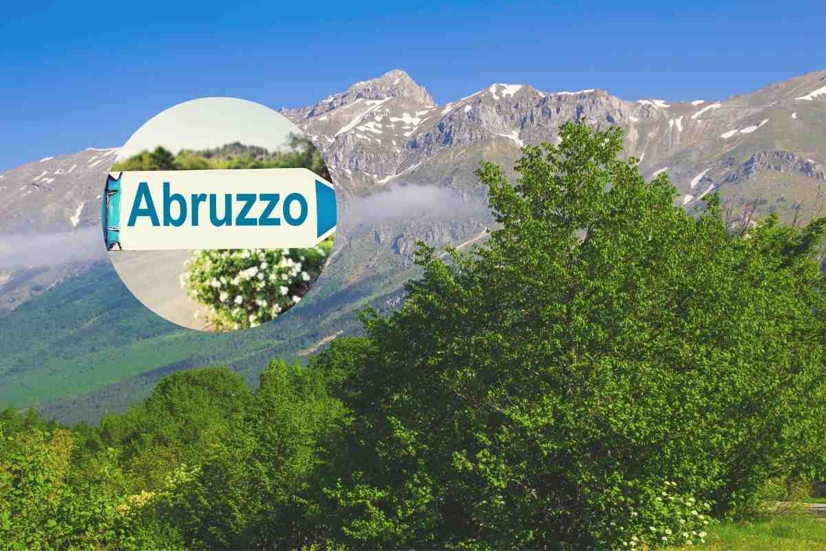 una vallata con montagne e nel cerchietto la scritta abruzzo