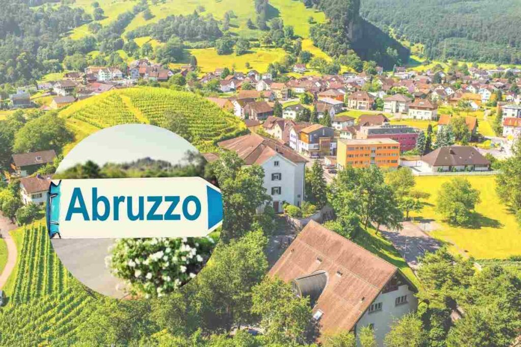 borgo verdeggiante e cerchietto con scritta abruzzo
