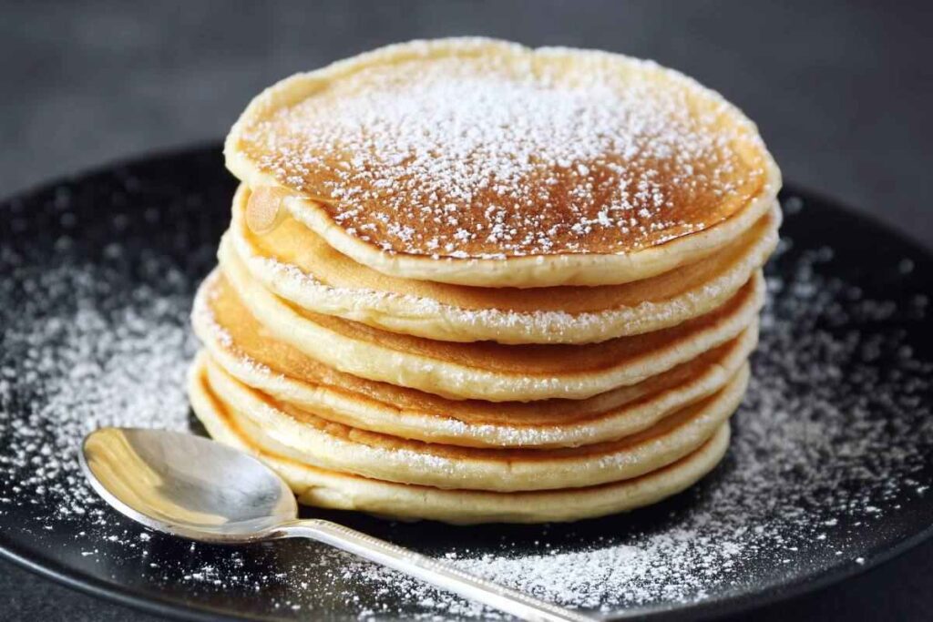 firttelle con zucchero nel piatto