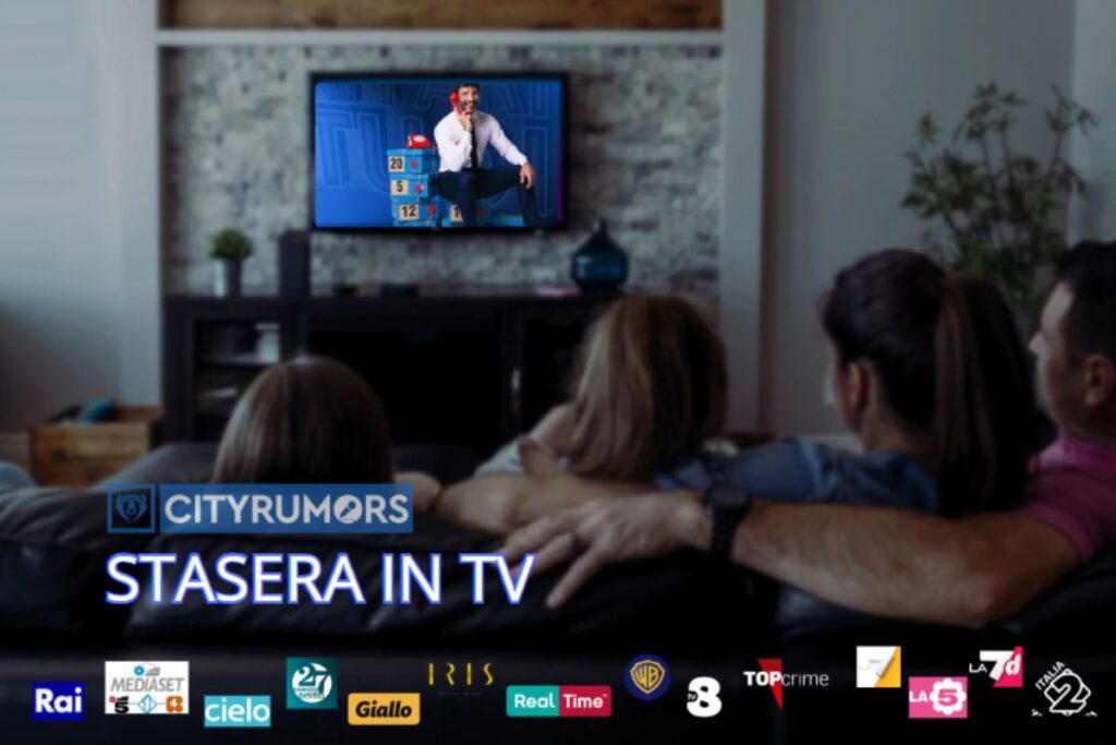 famiglia che guarda la tv