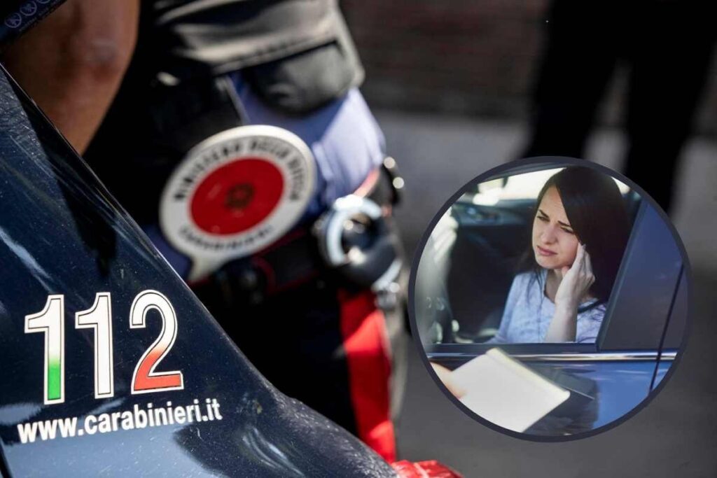 paletta del 112 e donna in auto