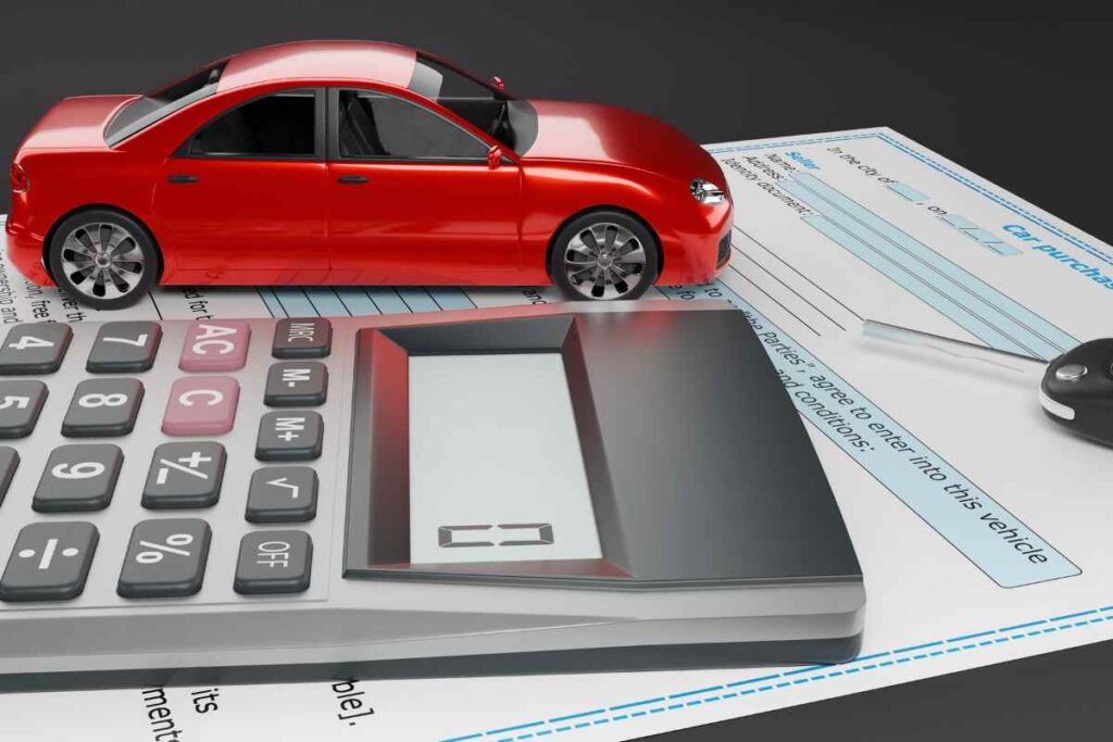 calcolatrice, macchina in miniatura e documento