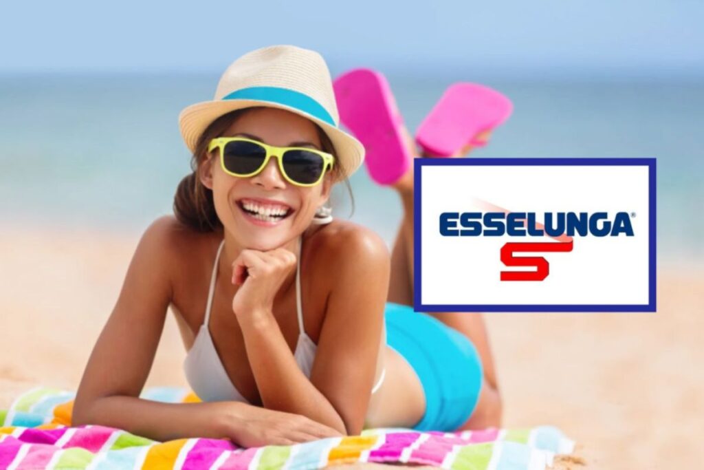 donna in spiaggia sdraiata sull'asciugamano e logo esselunga