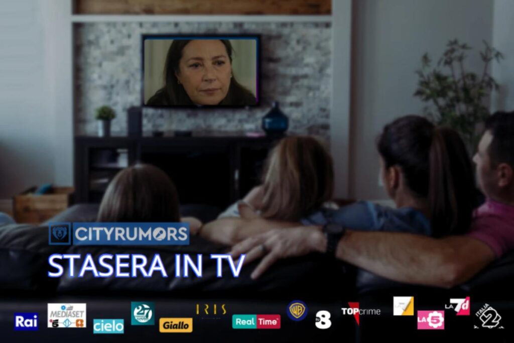 famiglia che guarda la tv