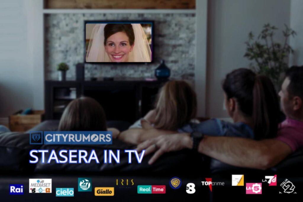 famiglia che guarda la tv