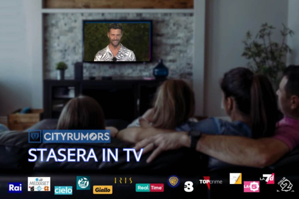 famiglia che guarda la tv