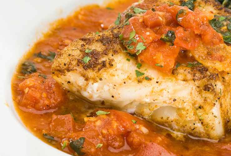 baccalà con il pomodoro e prezzemolo