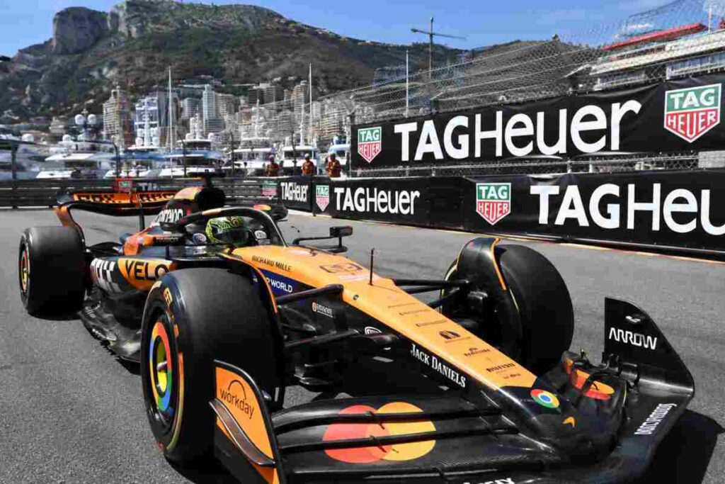 McLaren Formula 1 al GP di Monaco durante la celebrazione dei 1000 Gran Premi, monoposto papaya in azione sul circuito cittadino del Principato.