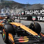McLaren Formula 1 al GP di Monaco durante la celebrazione dei 1000 Gran Premi, monoposto papaya in azione sul circuito cittadino del Principato.
