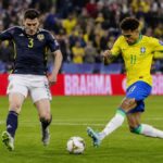 Scozia-Brasile ai Mondiali 2026, contrasto tra un giocatore scozzese e uno brasiliano in azione durante una partita decisiva del Gruppo C.